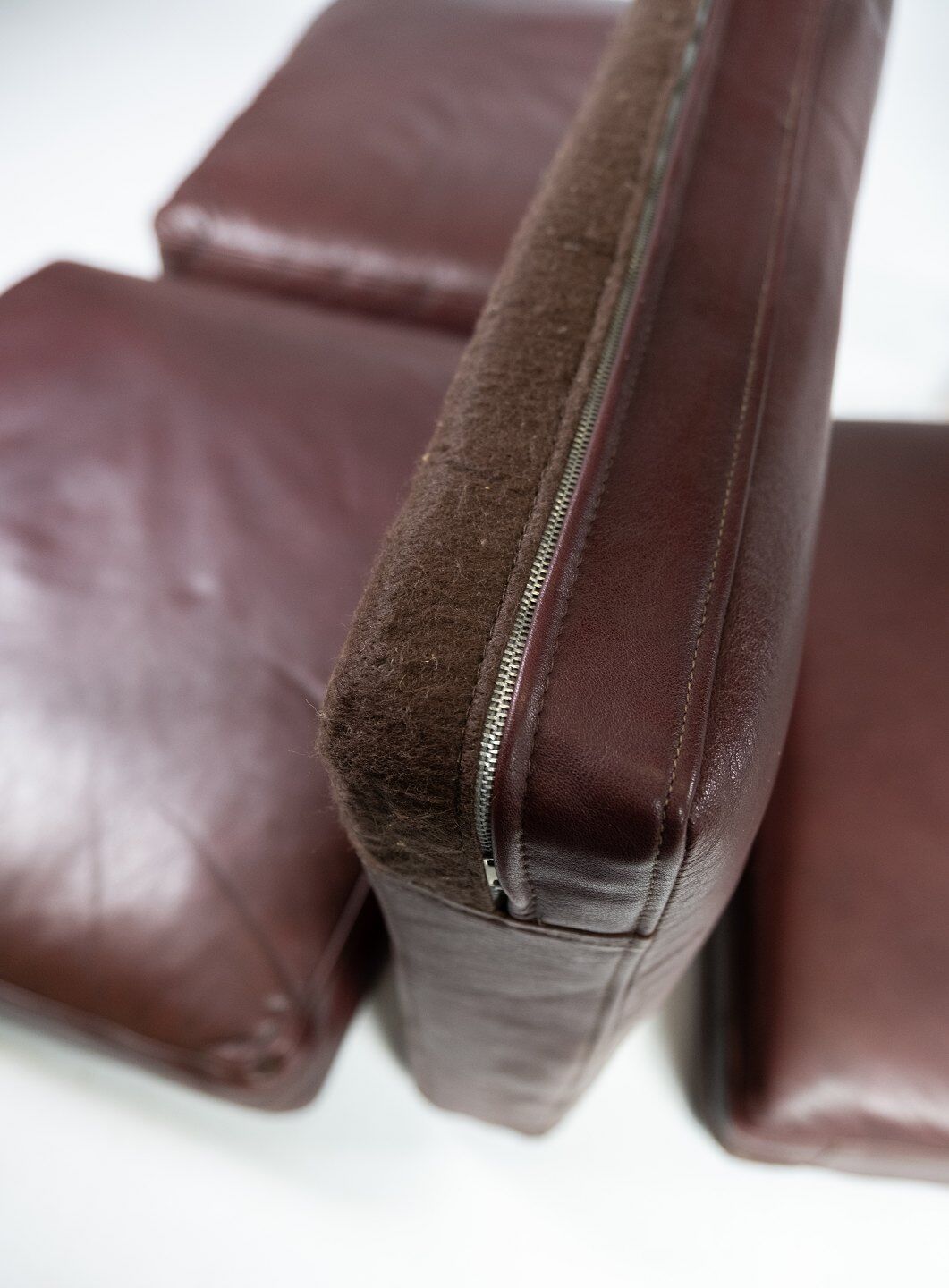 Two seater sofa, with red brown leather by Stouby Furniture