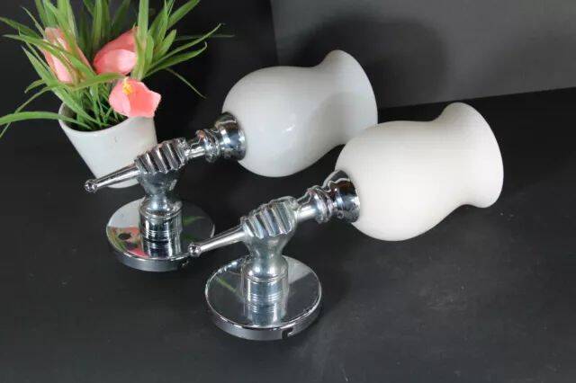 Pair of chrome-plated metal wall lights, hand-shaped with lampshade