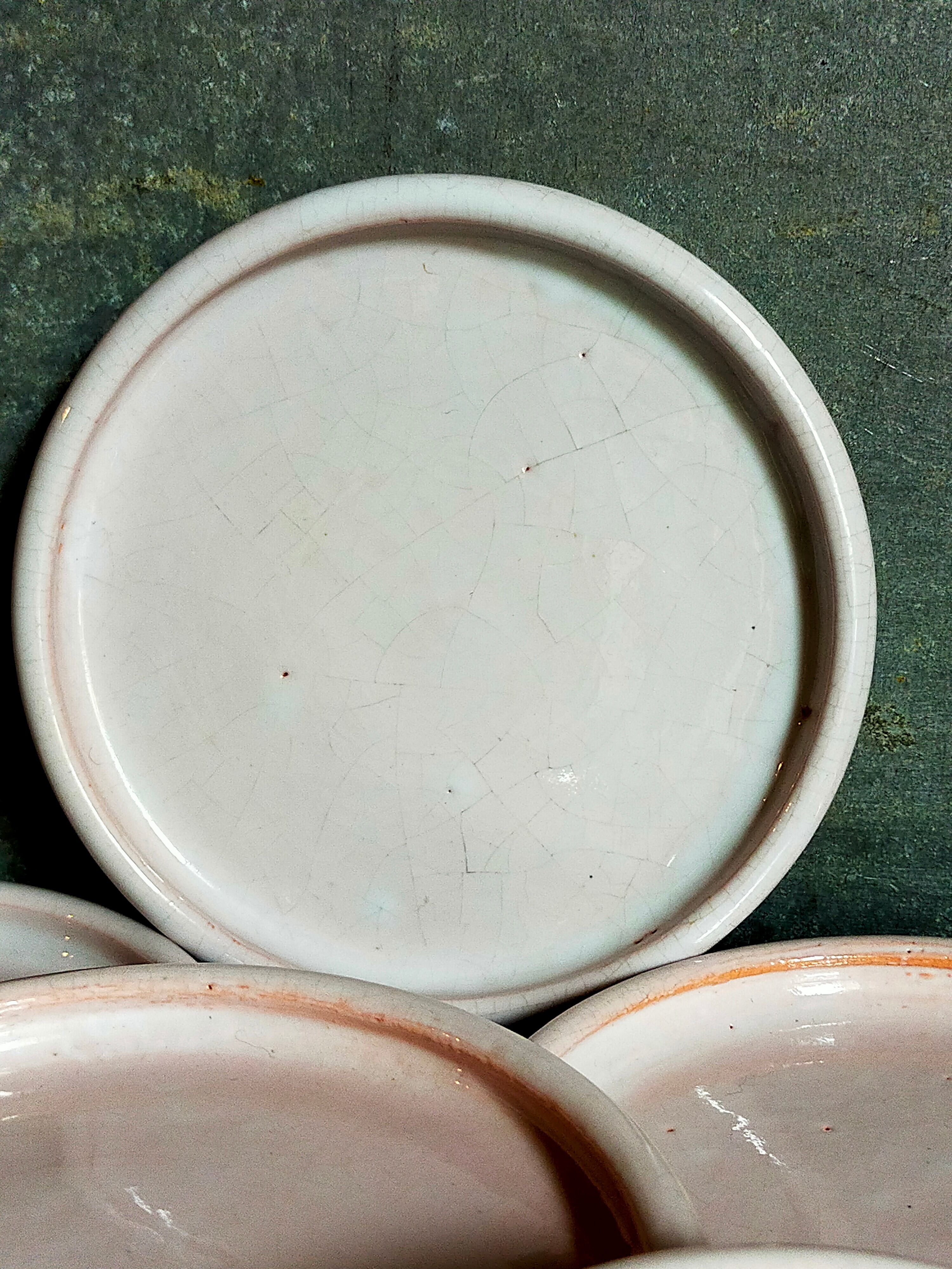 Six antique enamelled earth cut-cups