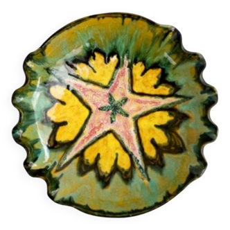 Multicolored earthenware dish signed Yvon Roy