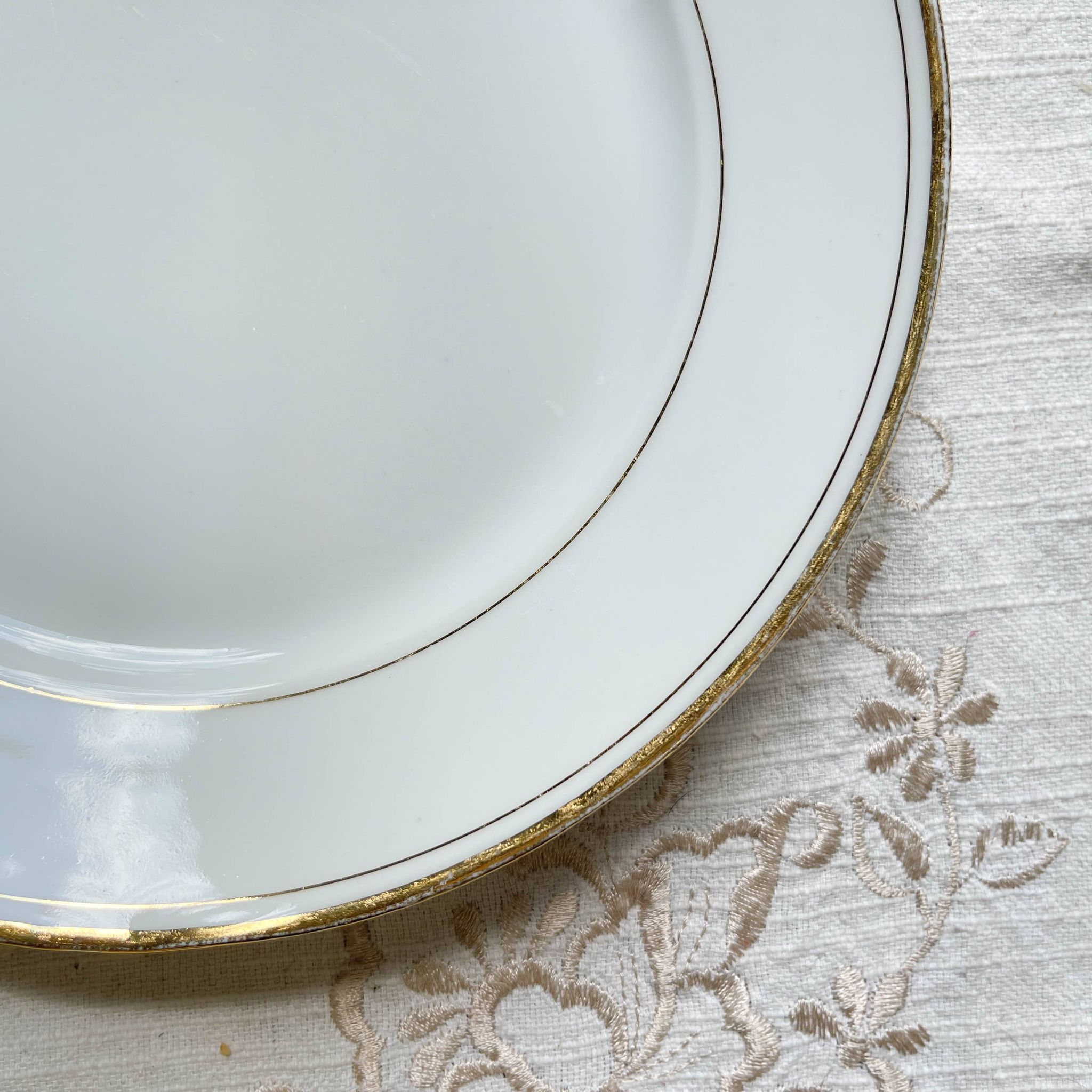 6 Small vintage French plates in golden white Limoges porcelain