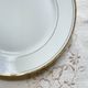 6 Small vintage French plates in golden white Limoges porcelain