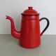 Set milk pot, kettle, coffee maker and red enamelled strainer