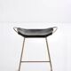 Pair of contemporary kitchen bar stools, in metal and black leather.