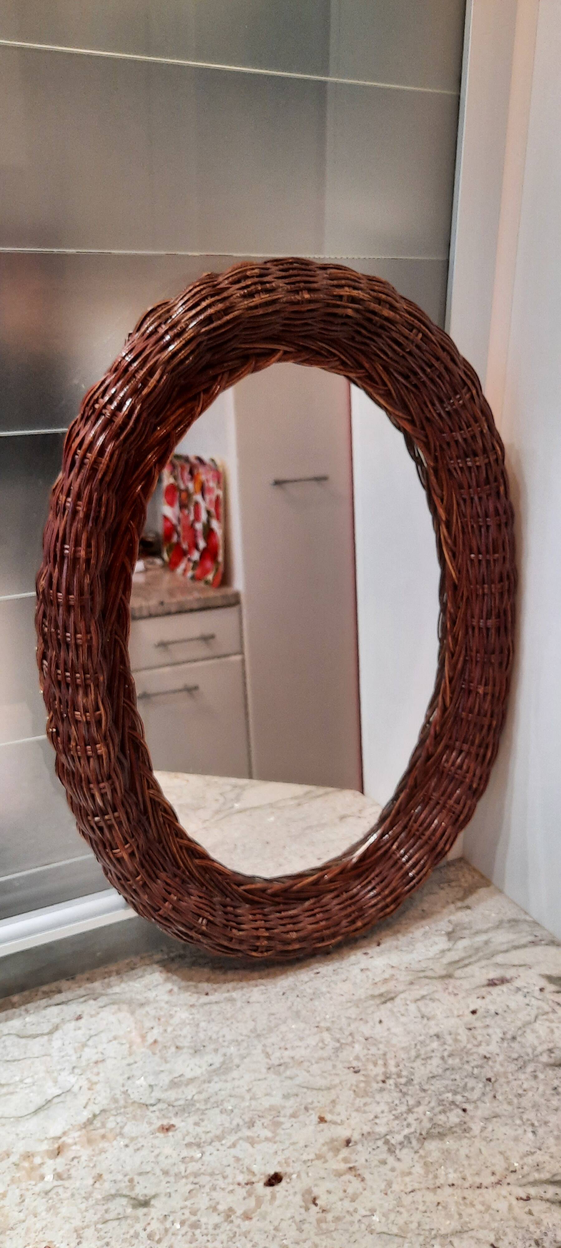 Vintage woven wicker oval mirror