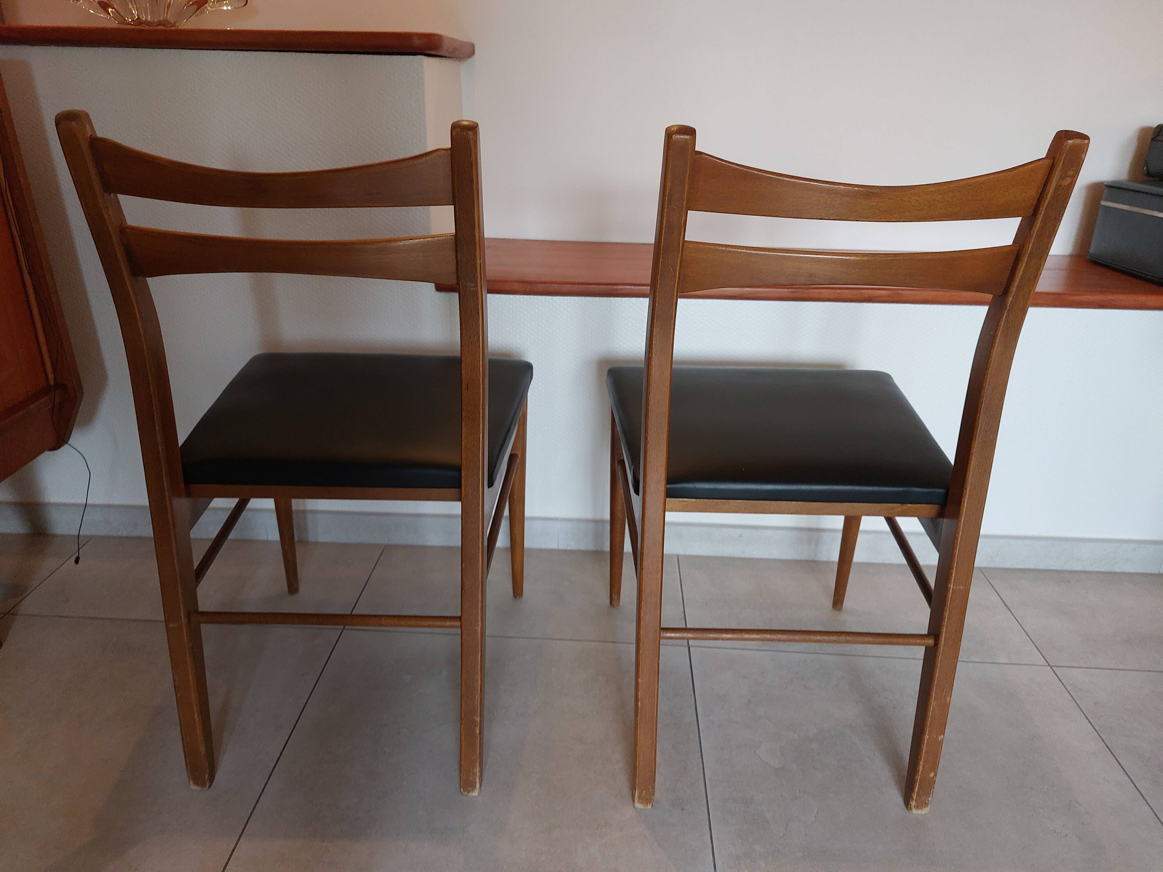 5 Scandinavian style chairs, wood and black faux leather.