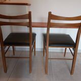 5 Scandinavian style chairs, wood and black faux leather.