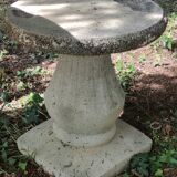 Old garden furniture in reconstituted stone