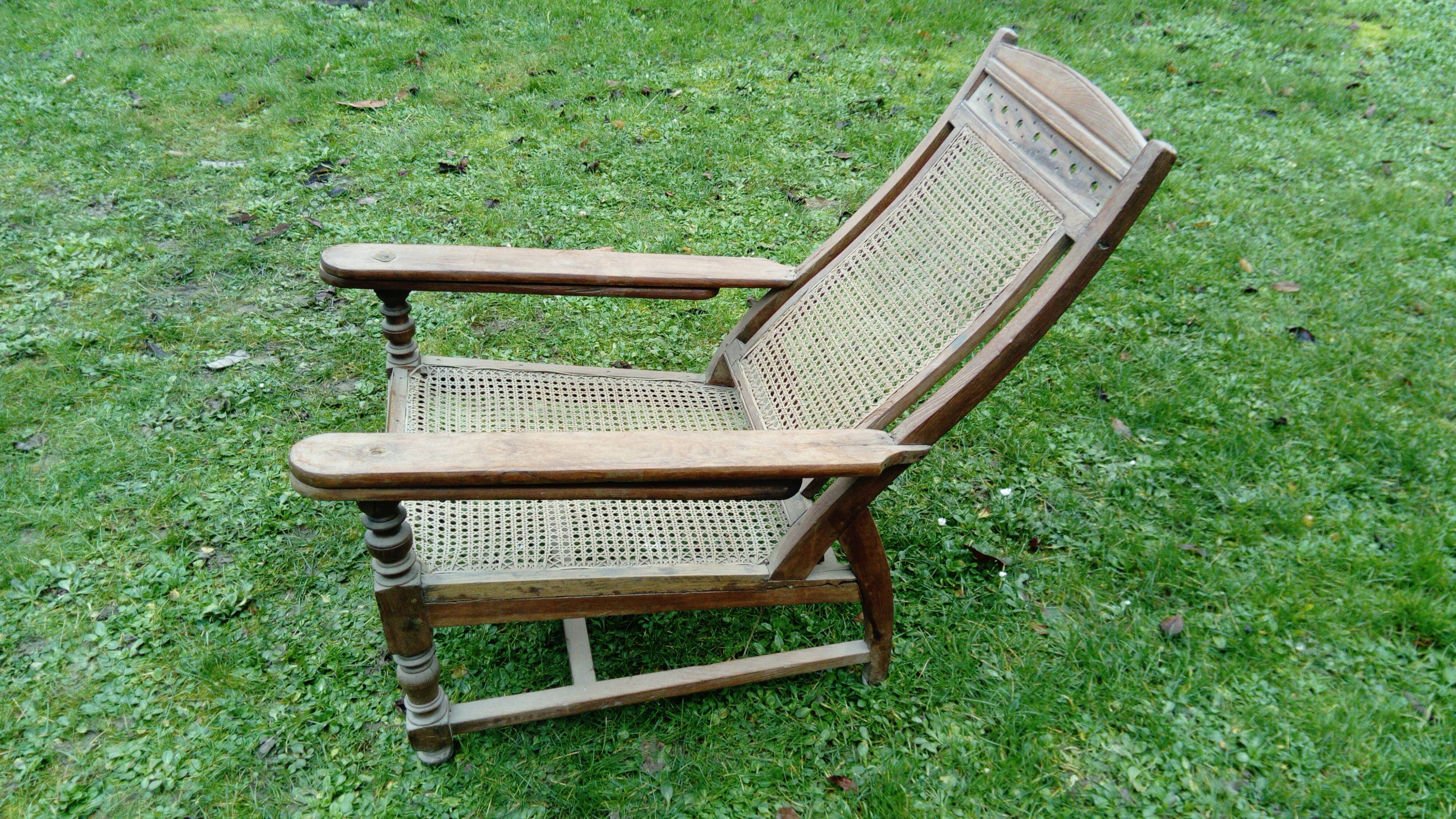Fauteuil colonial avec repose pieds