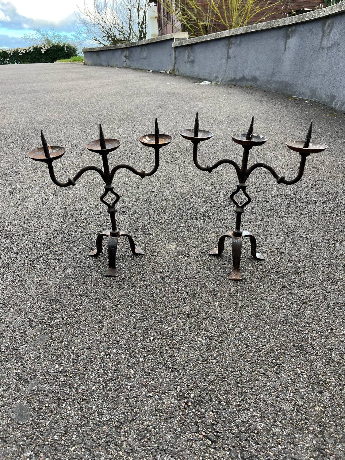 Pair of antique brutalist wrought iron candlesticks