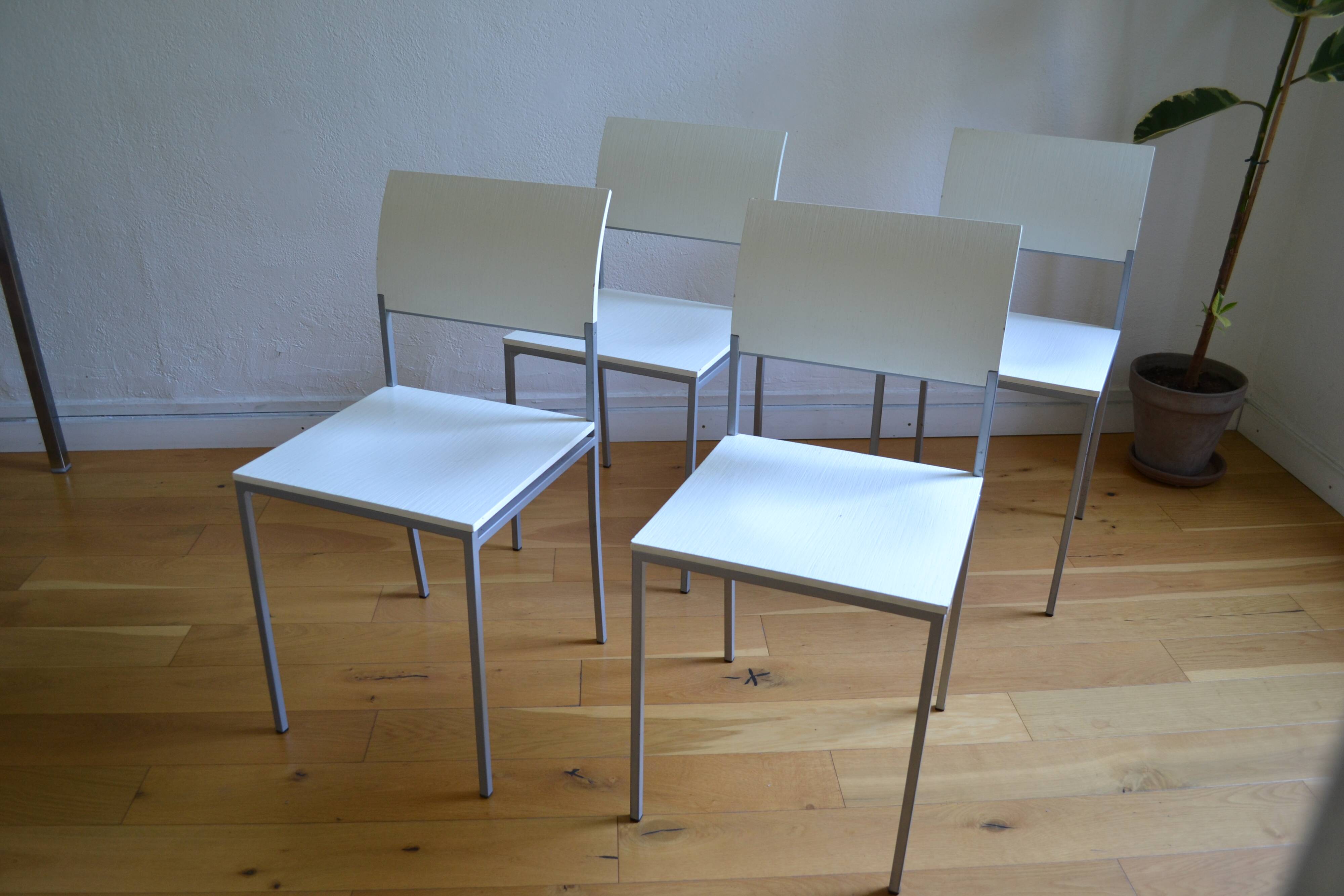 Set of 4 vintage metal and wood chairs from the 1990s.