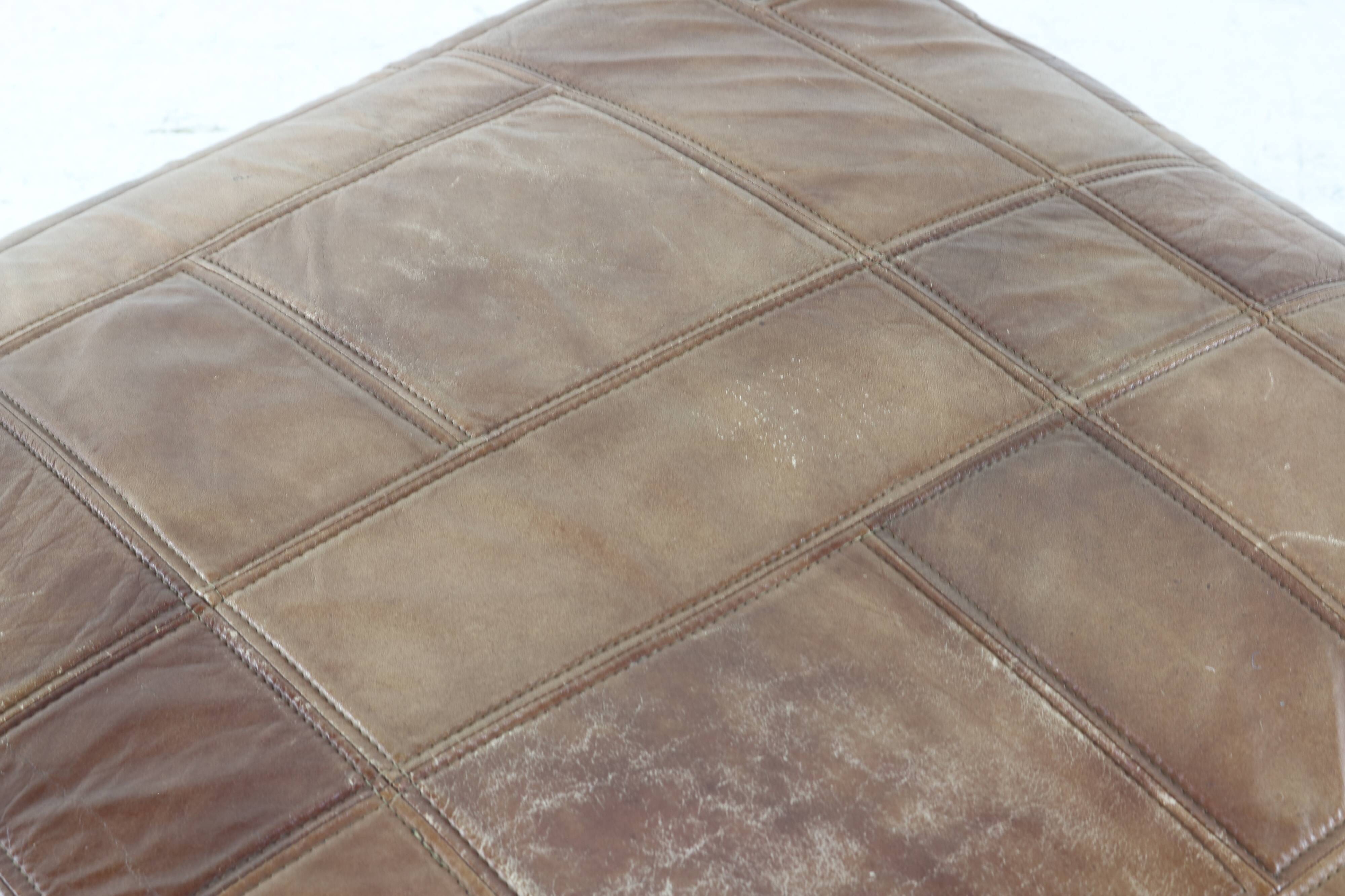 Seventies vintage patchwork leather pouf