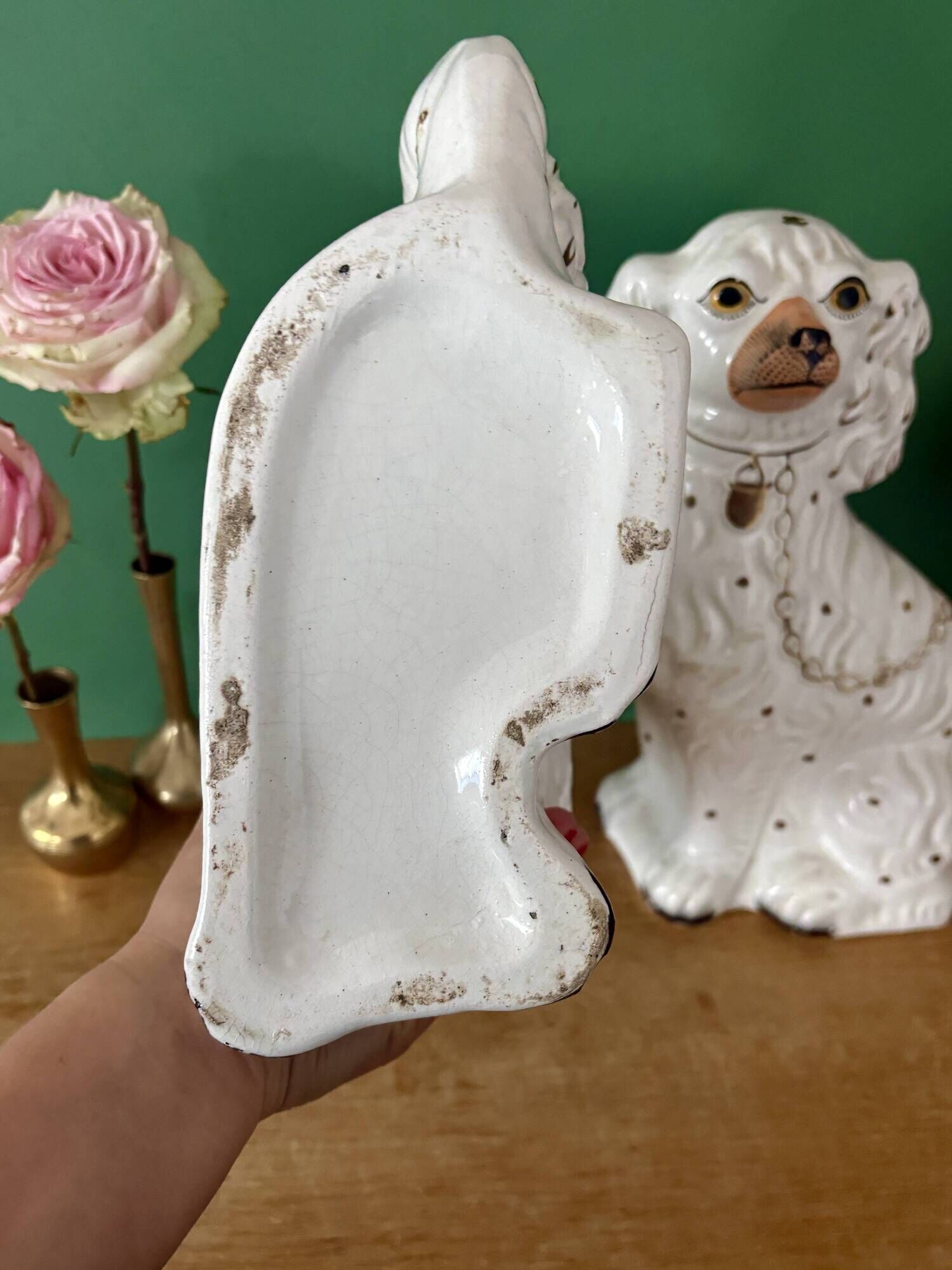 Pair of Staffordshire-type dogs in white and gold ceramic