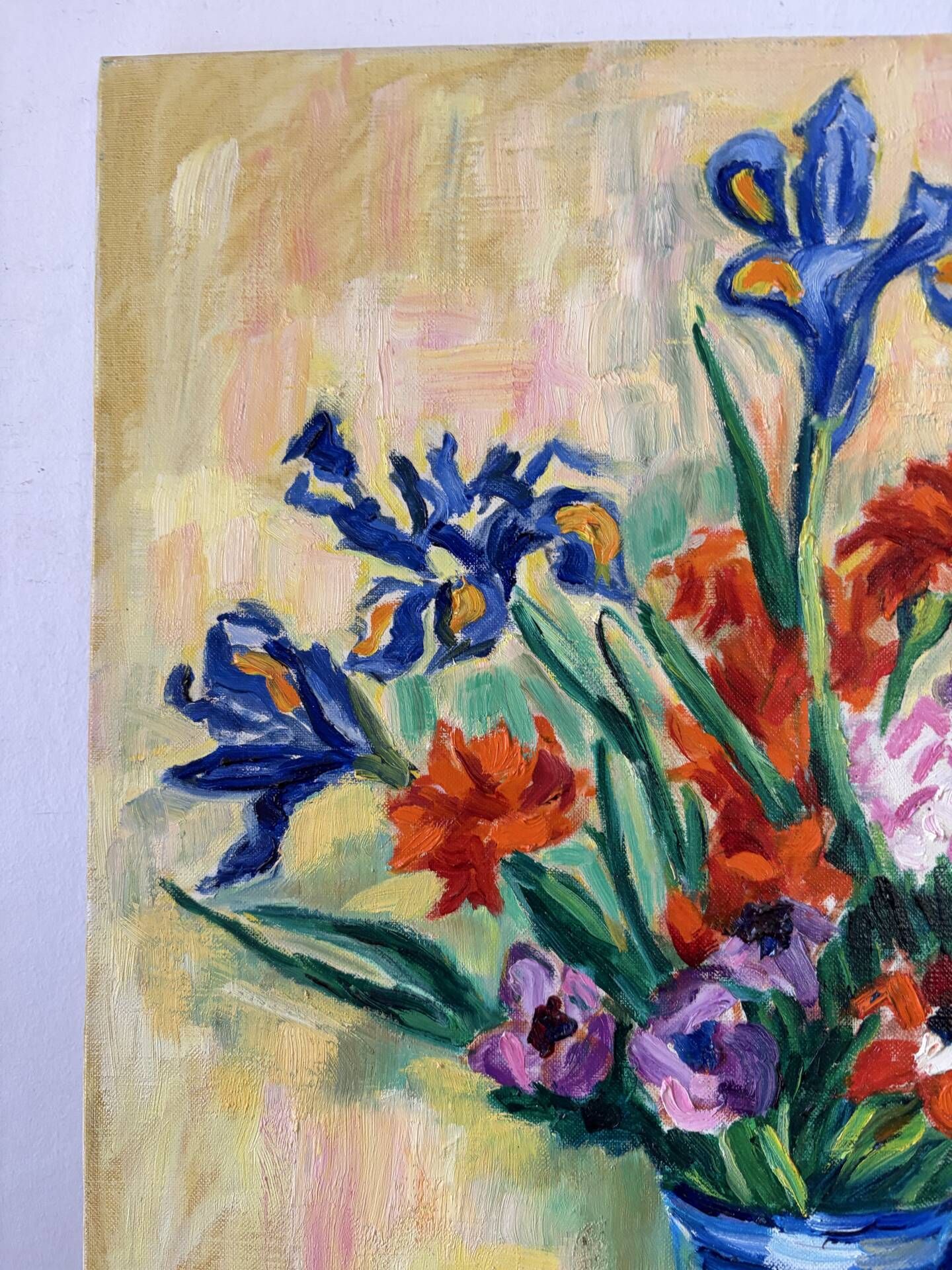 Iris and orange carnations, oil on canvas signed Gisèle Renaut.