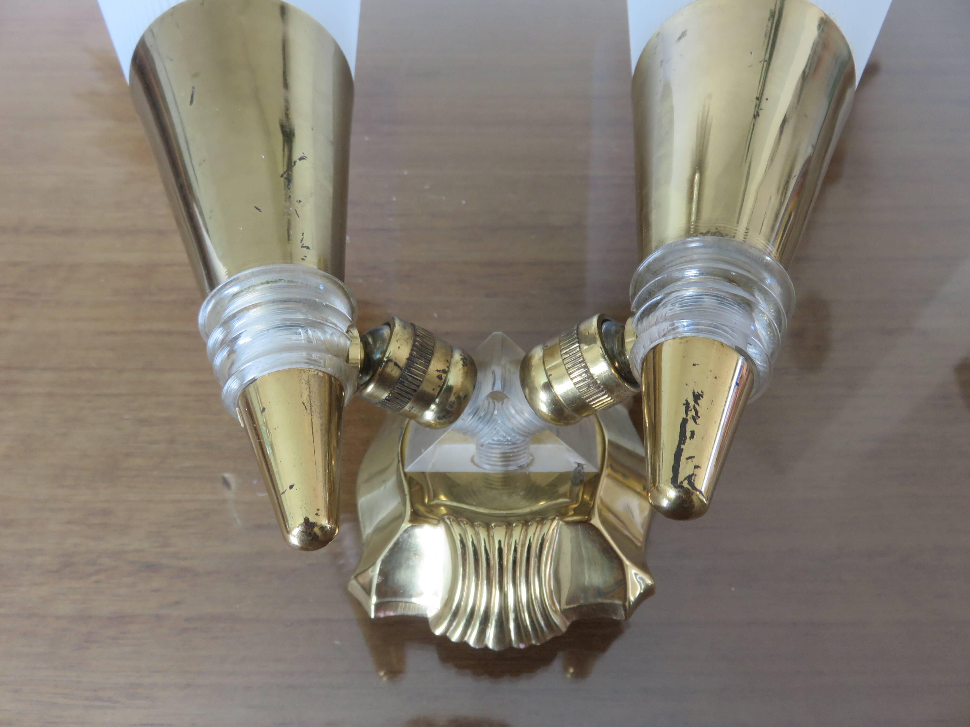 Double wall light in perspex and gold metal from the 50s and 60s.