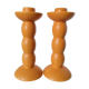 2 orange ceramic candle holders