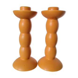 2 orange ceramic candle holders