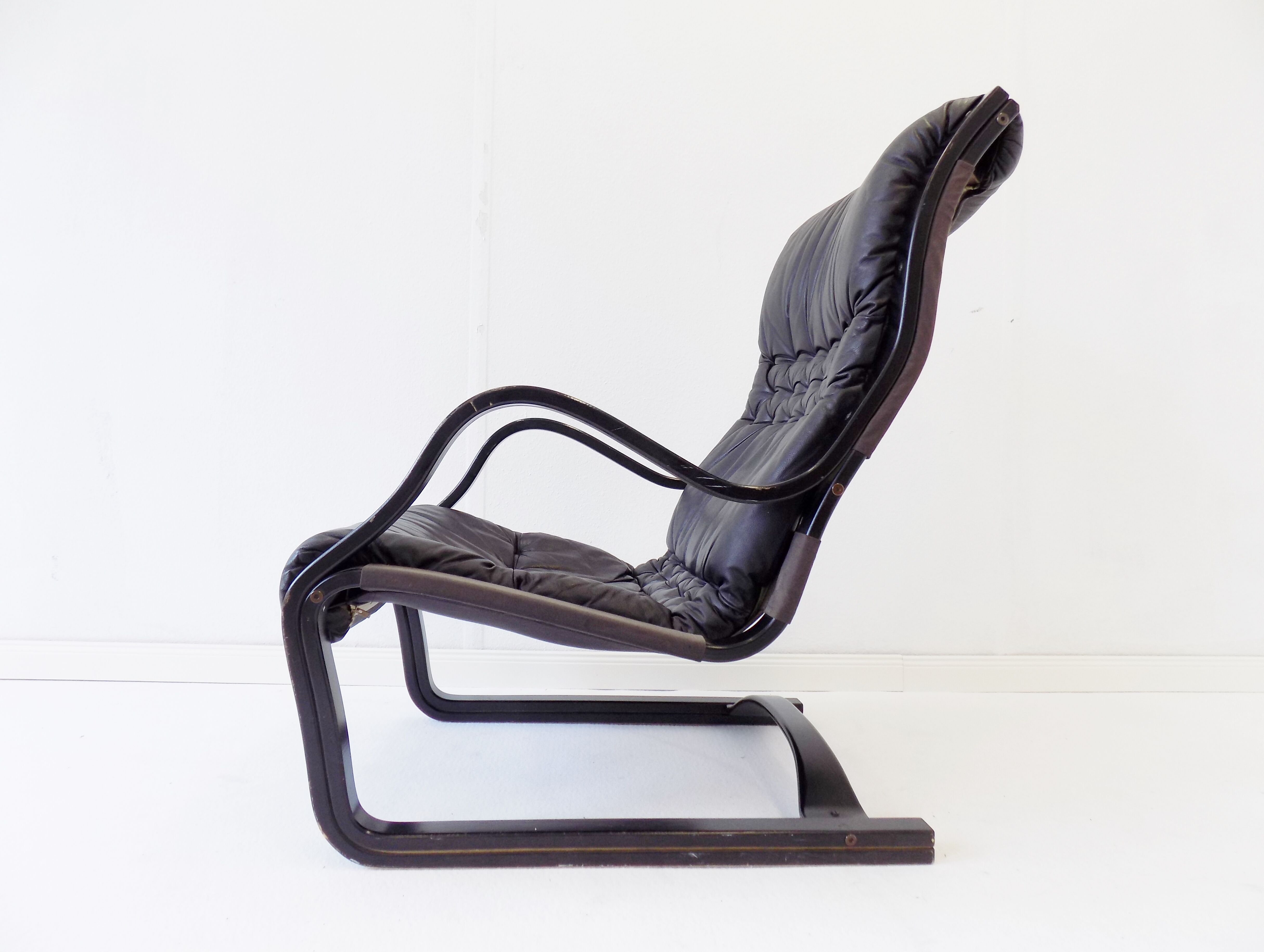 Asko Koivutaru black leather armchair by Esko Pajamies