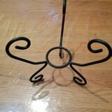 Glass vase on vintage wrought iron feet