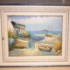 Oil on canvas of a boat on the foreshore signed Yann 55X45