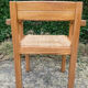 Brutalist chair in solid pine with a straw seat from the 1970s.