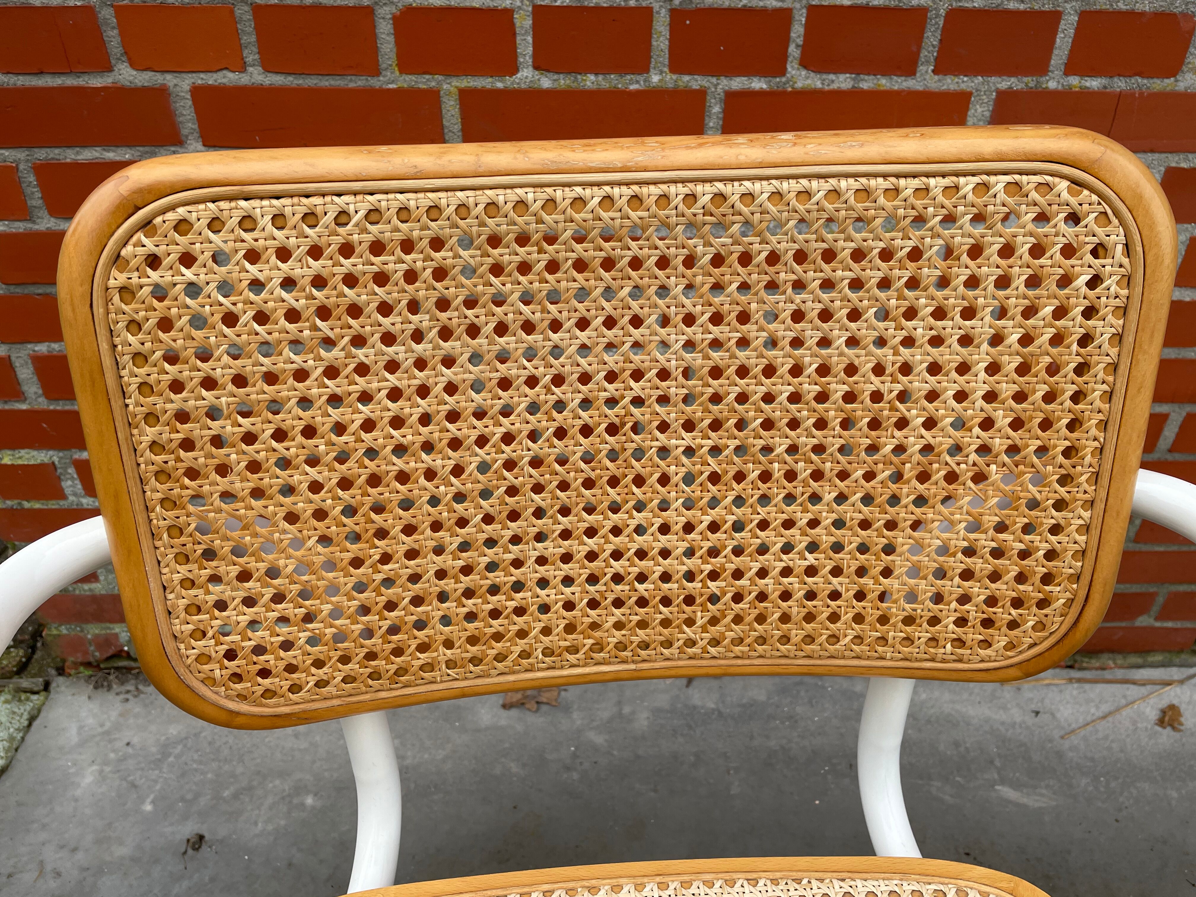 Cesca model chair with armrests white