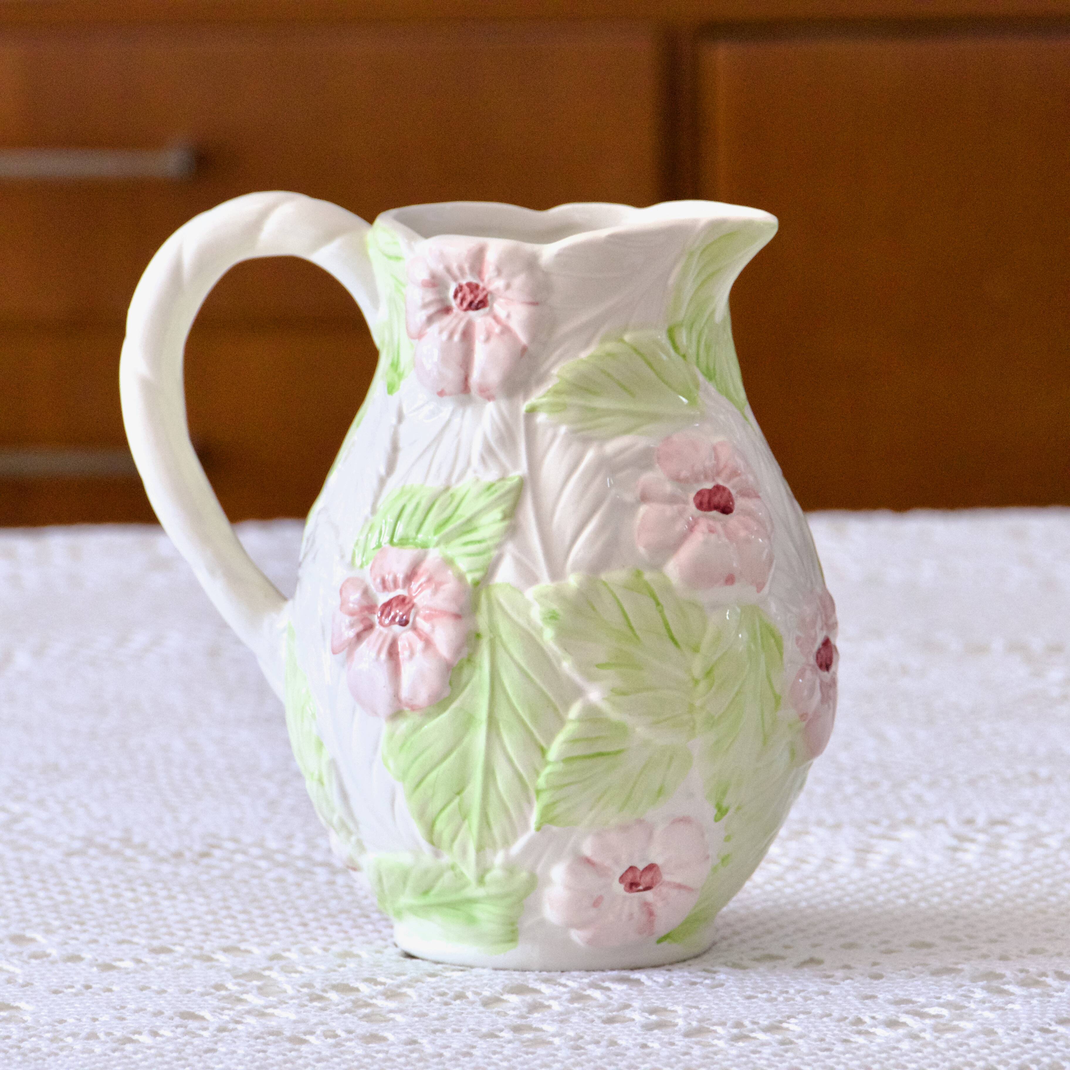 Hand-painted floral slip carafe