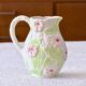 Hand-painted floral slip carafe