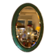 Vintage oval mirror with English green lacquered curved frame and chrome surround