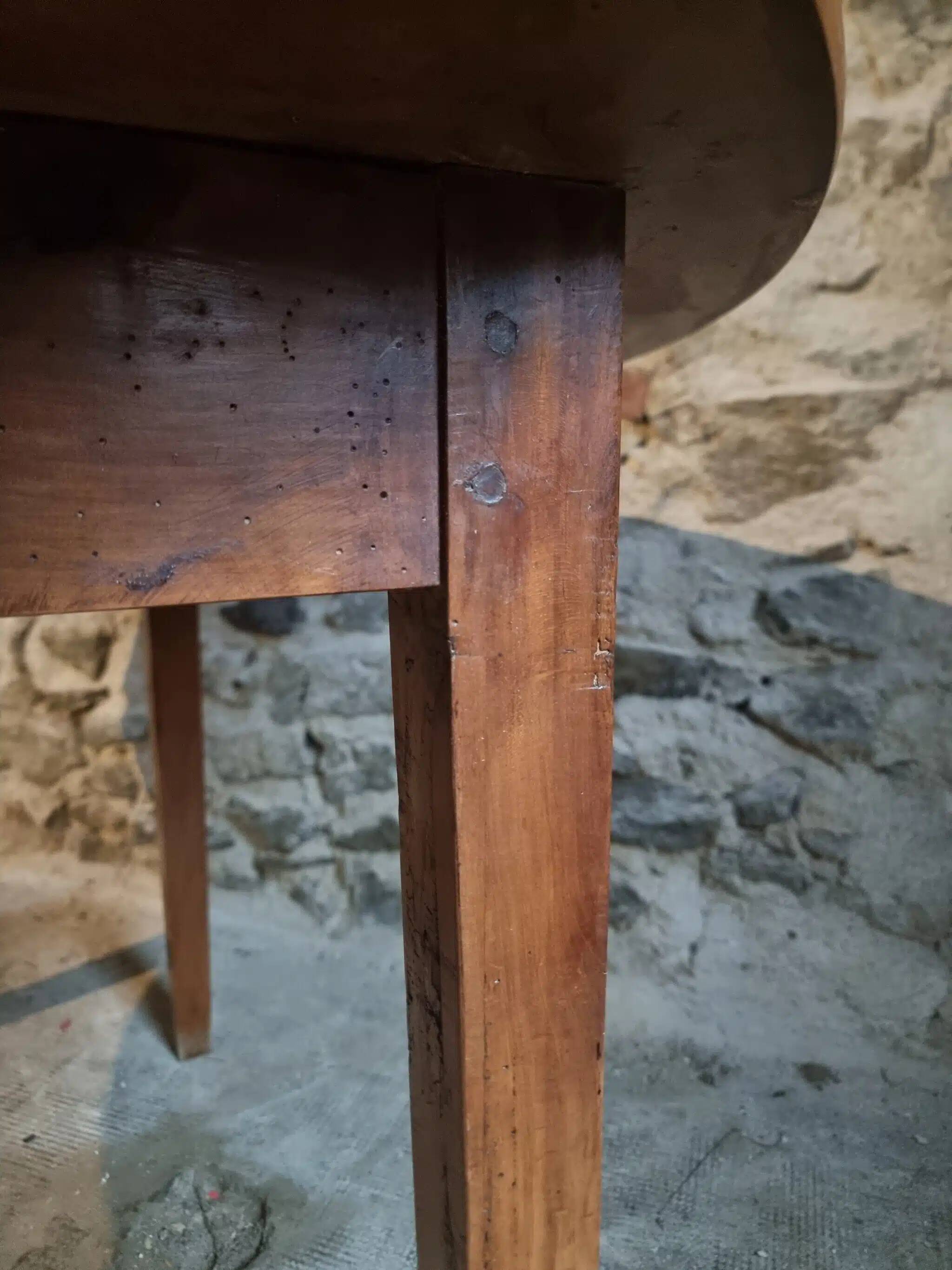 Antique round dining table in cherry wood, France, circa 1920.