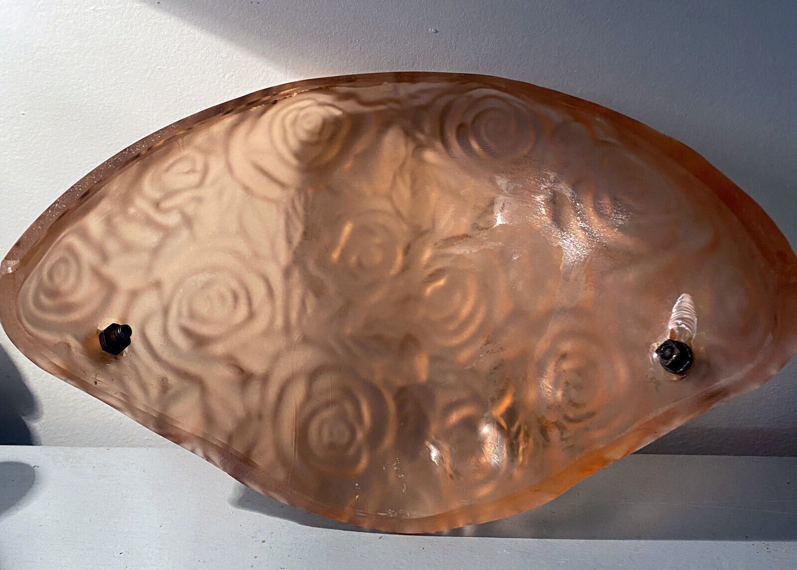 Art Deco wall lamp (1930) with rose patterns in molded pressed glass