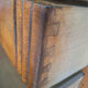 Art Deco commode with marble top, vintage antique furniture.