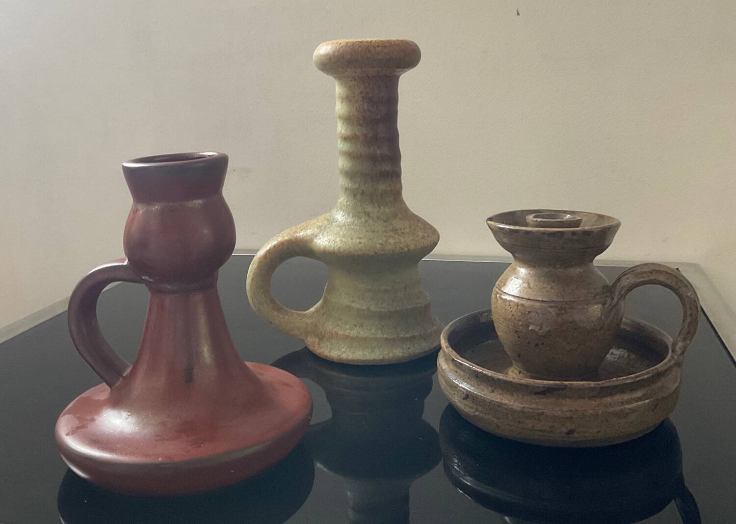 Trio of candlesticks with handles from the 60s-70s