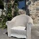 Large painted wicker armchair, 20th century, winter garden