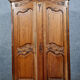 Louis XV style wardrobe with gendarme's hat in solid oak