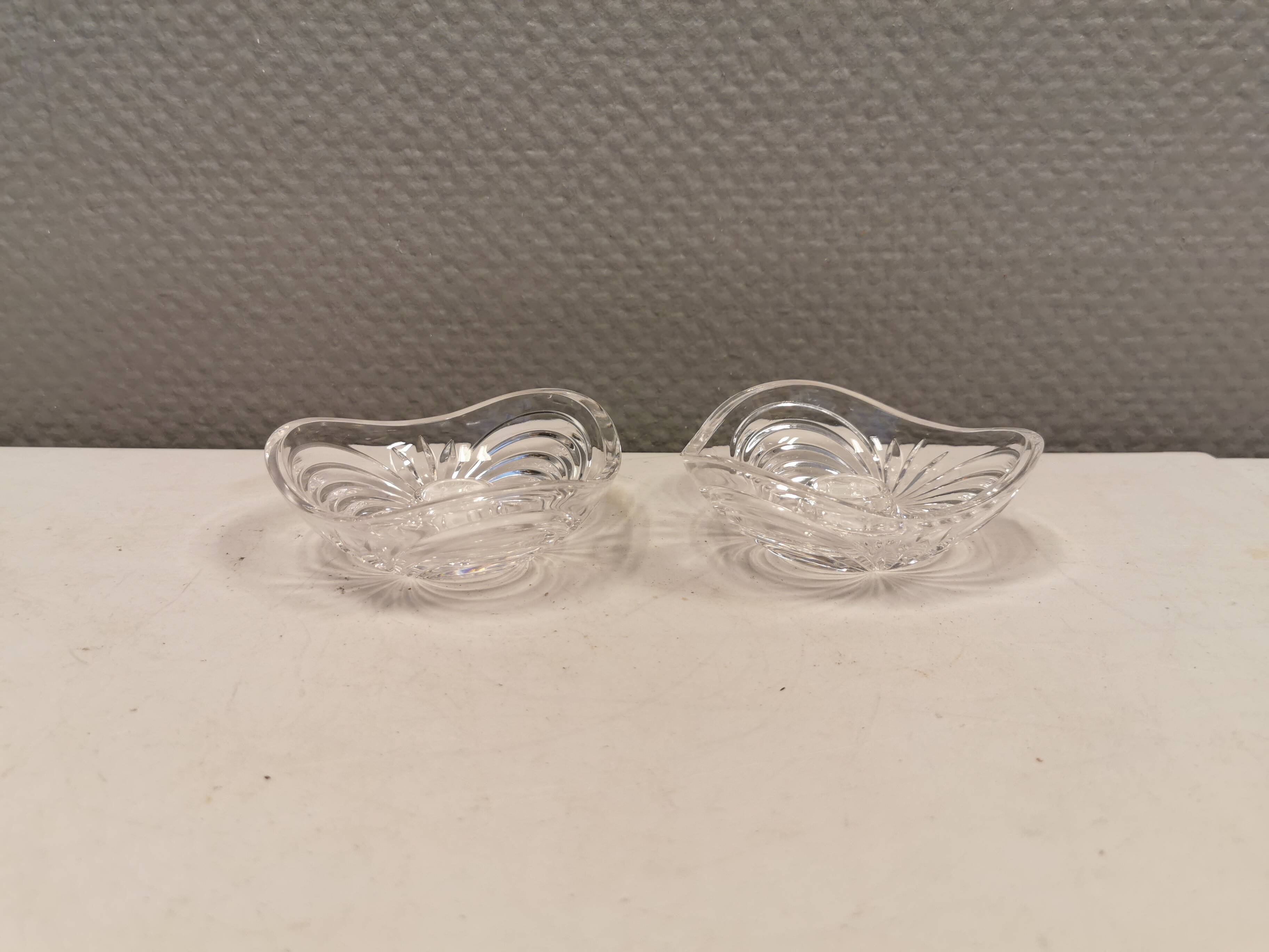 A set of beautiful rock crystal glass candle holders from Swedish Orrefors. Estimated 1970s.