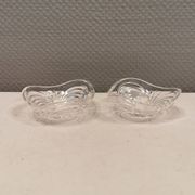 A set of beautiful rock crystal glass candle holders from Swedish Orrefors. Estimated 1970s.