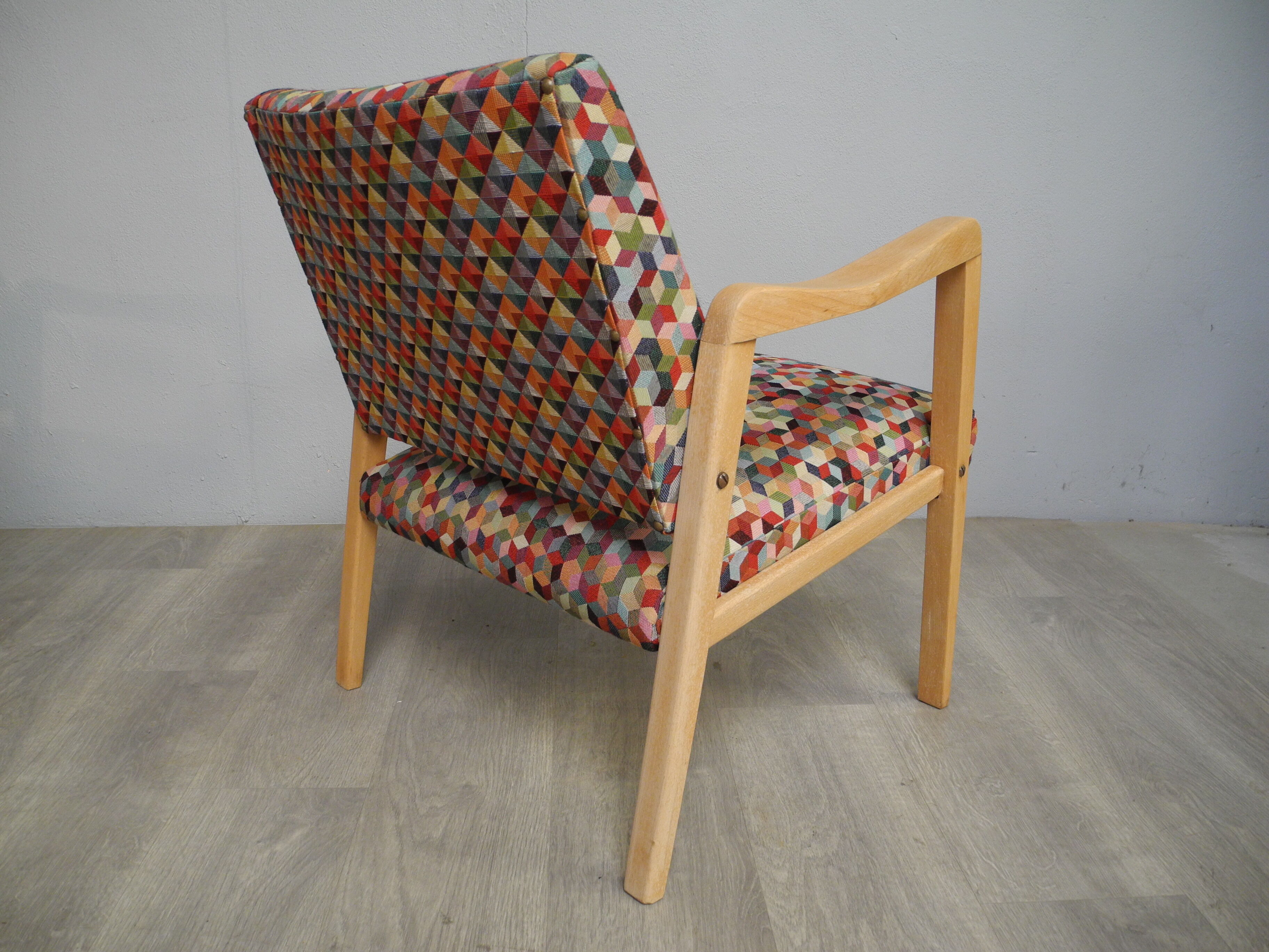 Vintage wood armchairs and fabrics 70s