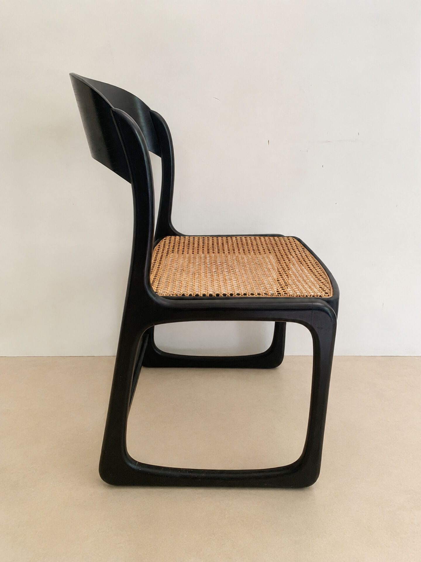 Set of 4 Baumann sled chairs with caning.