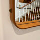 Jacques Adnet mirror covered in cognac leather