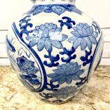Chinese vase in blue-white porcelain decorated with lotus flowers