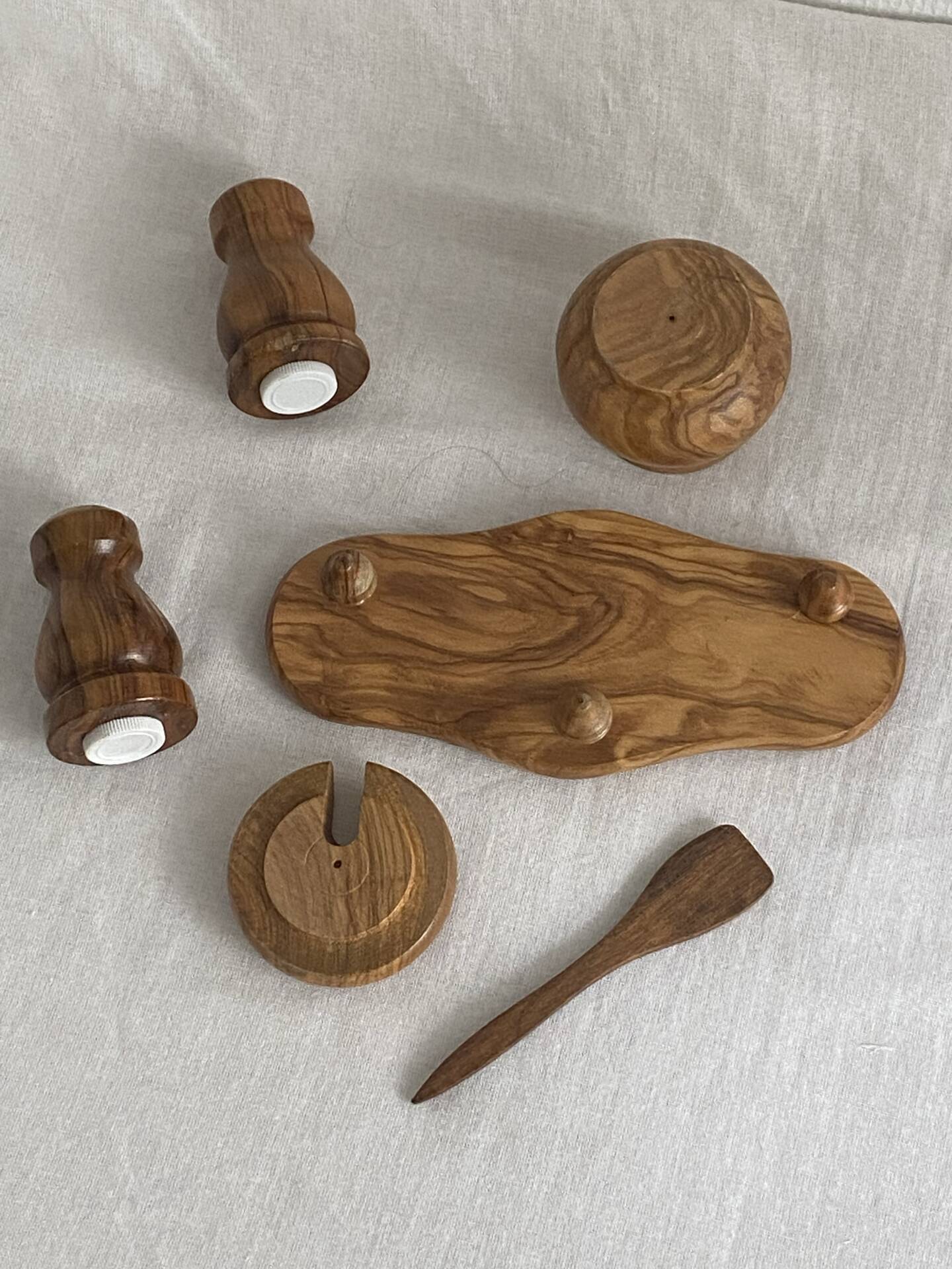 Condiment service (salt, pepper, and mustard) in olive wood