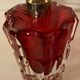 Red crystal perfume spray and red pump.