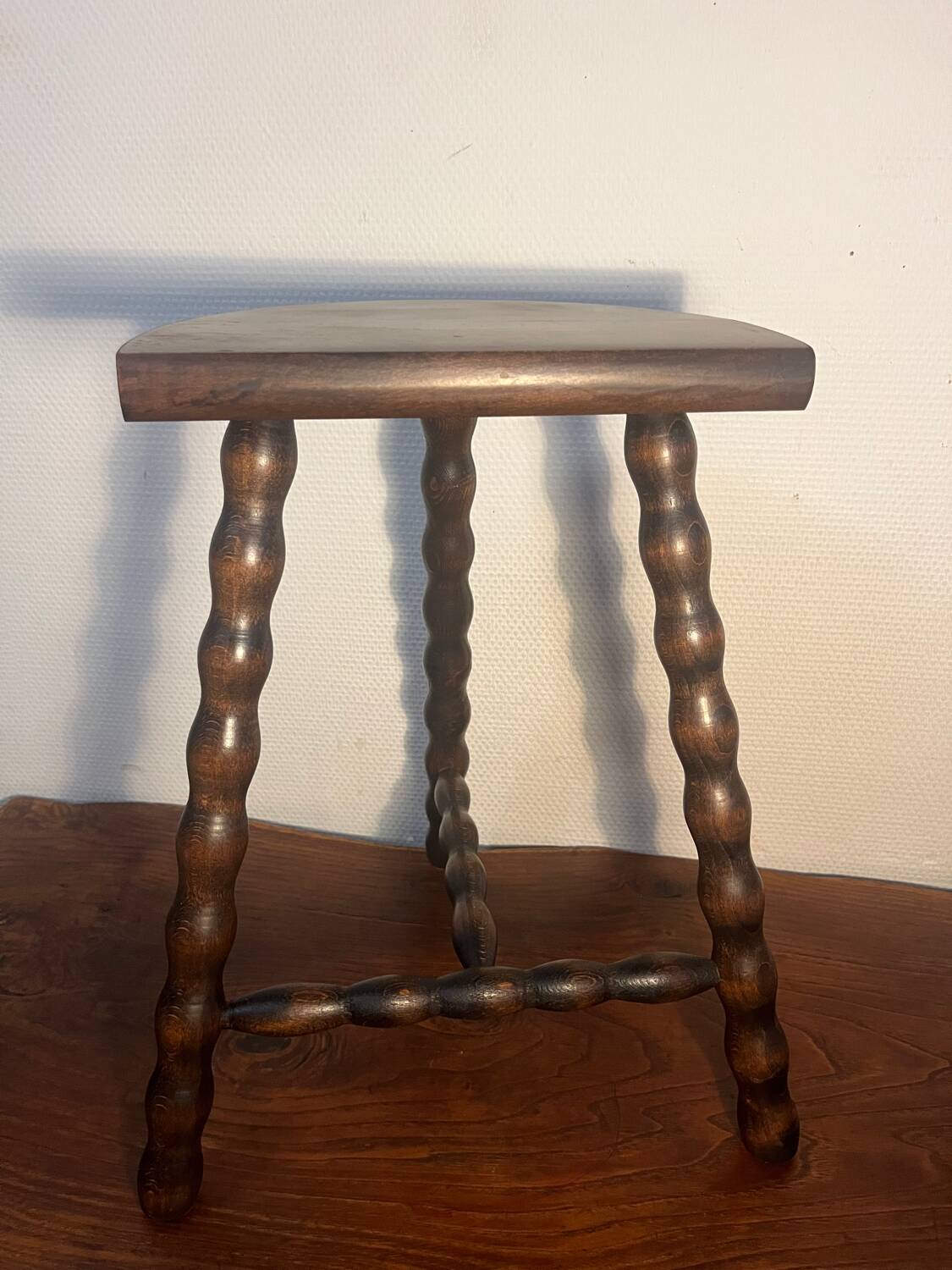Solid wood tripod stool with turned legs