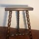 Solid wood tripod stool with turned legs
