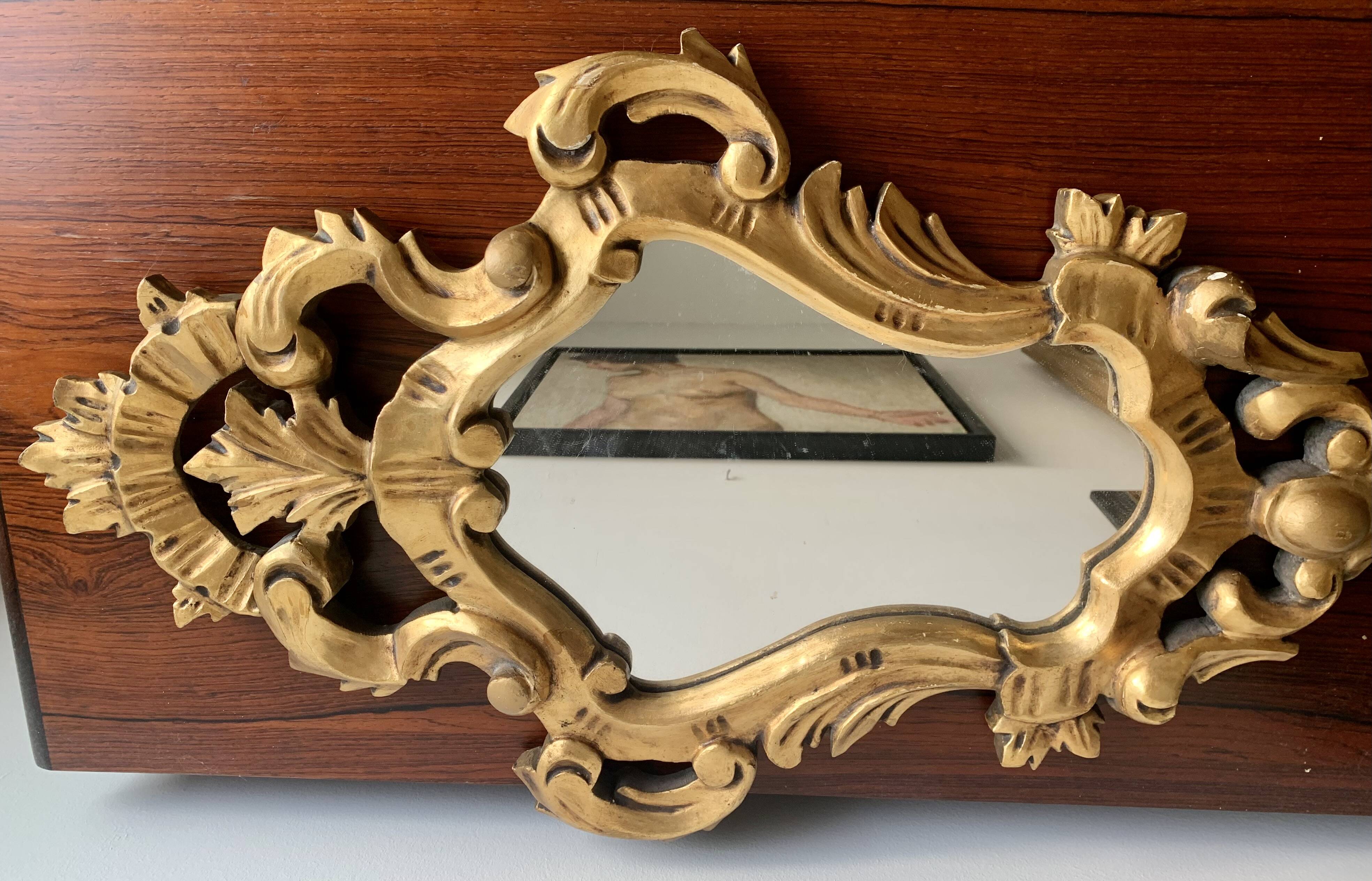 Golden wall mirror