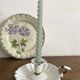 Antique enamelled sheet metal candle holder