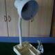 With organizer desk lamp