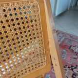 Vintage woven cane folding chair from the 80s