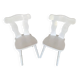 Pair of vintage white wooden bistro chairs